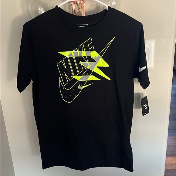 black and neon yellow nike shirt